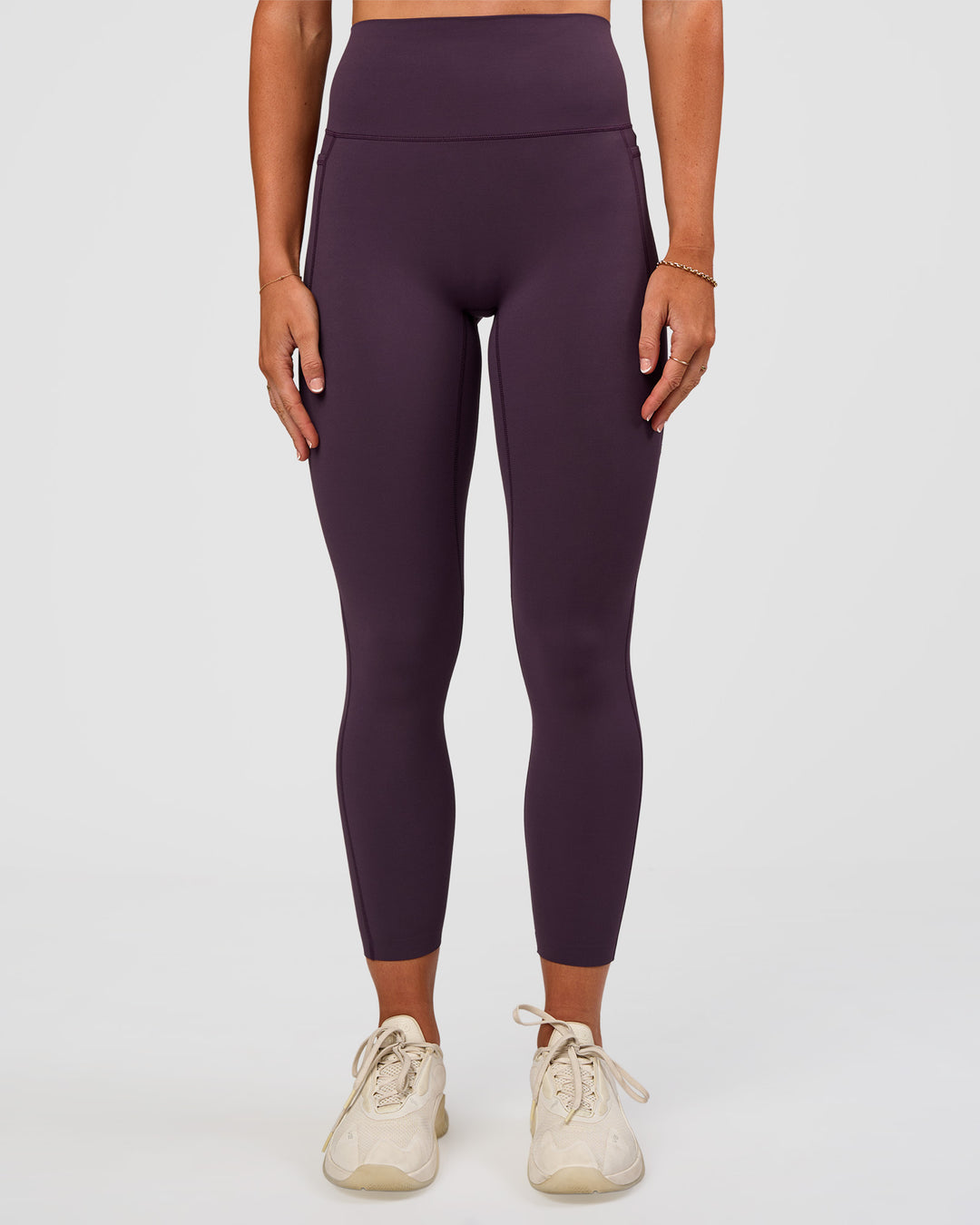 Woman wearing Elixir Ultra High-Rise 7/8 Legging Pockets - Midnight Plum | Model:Emelia | Size:S - view 6