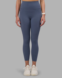 Woman wearing Elixir Ultra High-Rise 7/8 Legging Pockets - Night Shadow | Model:Phoebe | Size:S | Thumbnail Index: 7