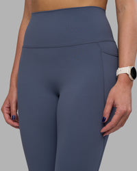 Woman wearing Elixir Ultra High-Rise 7/8 Legging Pockets - Night Shadow | Model:Phoebe | Size:S | Thumbnail Index: 5