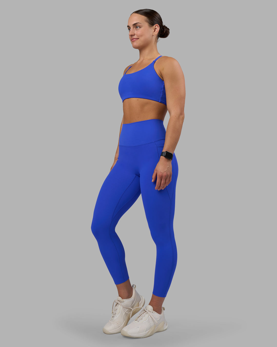 Woman wearing Elixir Ultra High-Rise 7/8 Legging Pockets - Power Cobalt | Model:Keisha | Size:S - view 6