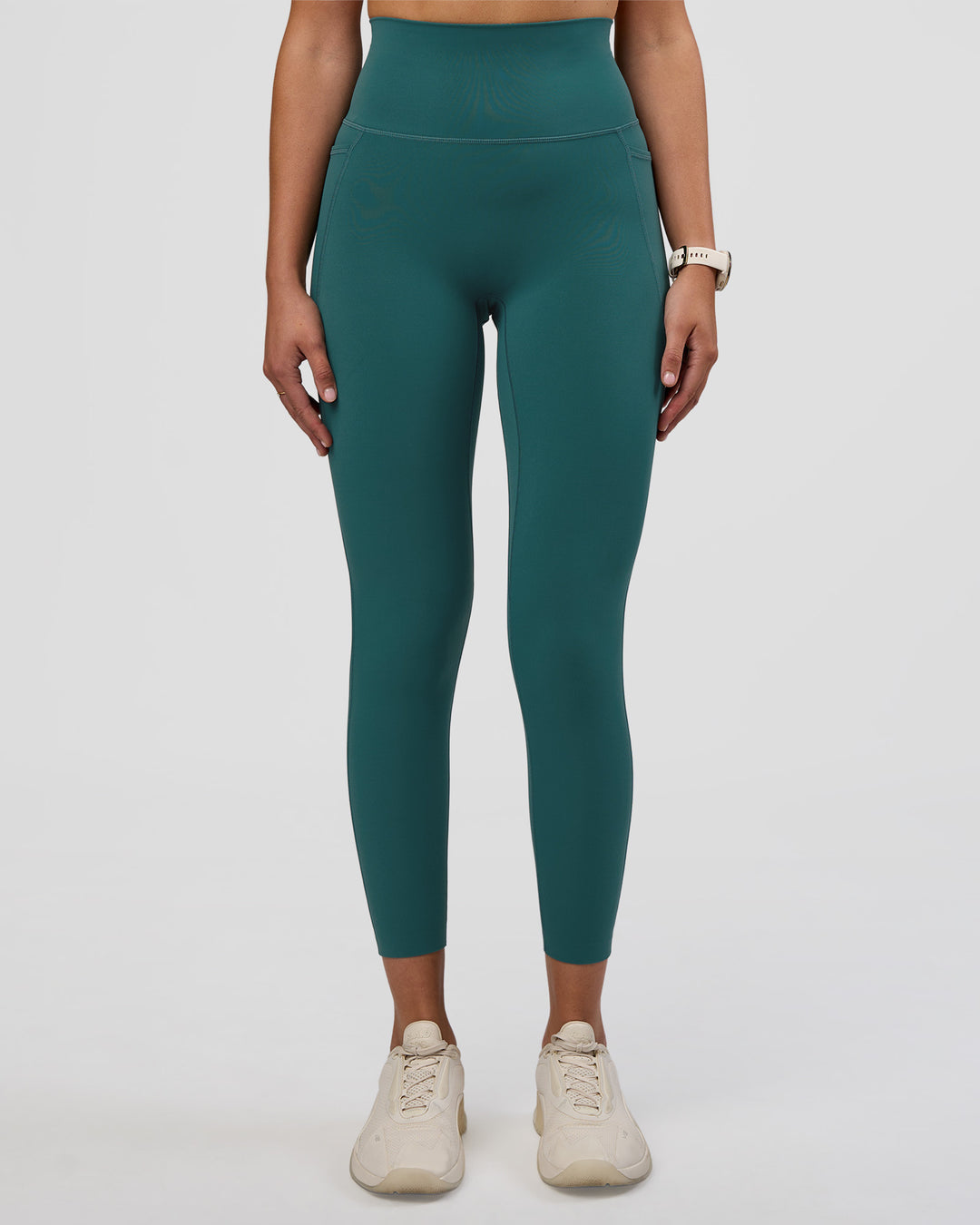 Woman wearing Elixir Ultra High-Rise 7/8 Legging Pockets - Transformative Teal | Model:Myrte | Size:S - view 6