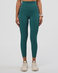 Woman wearing Elixir Ultra High-Rise 7/8 Legging Pockets - Transformative Teal | Model:Myrte | Size:S | Thumbnail Index: 5