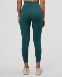 Woman wearing Elixir Ultra High-Rise 7/8 Legging Pockets - Transformative Teal | Model:Myrte | Size:S | Thumbnail Index: 3