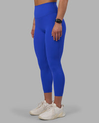 Woman wearing Elixir Ultra High-Rise 7/8 Legging - Power Cobalt | Model:Keisha | Size:S | Thumbnail Index: 1