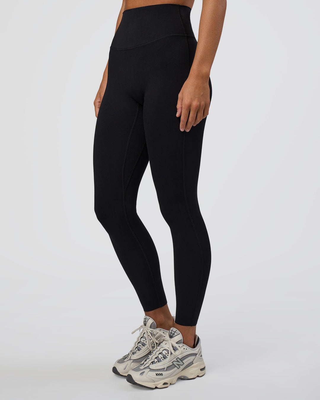 Woman wearing Elixir Ultra High-Rise Full Length Legging - Black | Model:Amity | Size:S - view 2