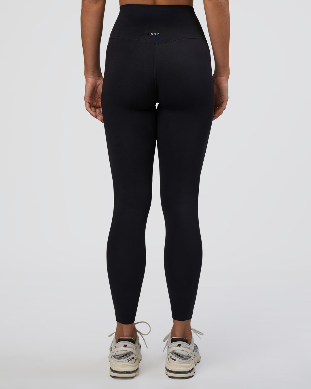 Woman wearing Elixir Ultra High-Rise Full Length Legging - Black | Model:Amity | Size:S - view 7