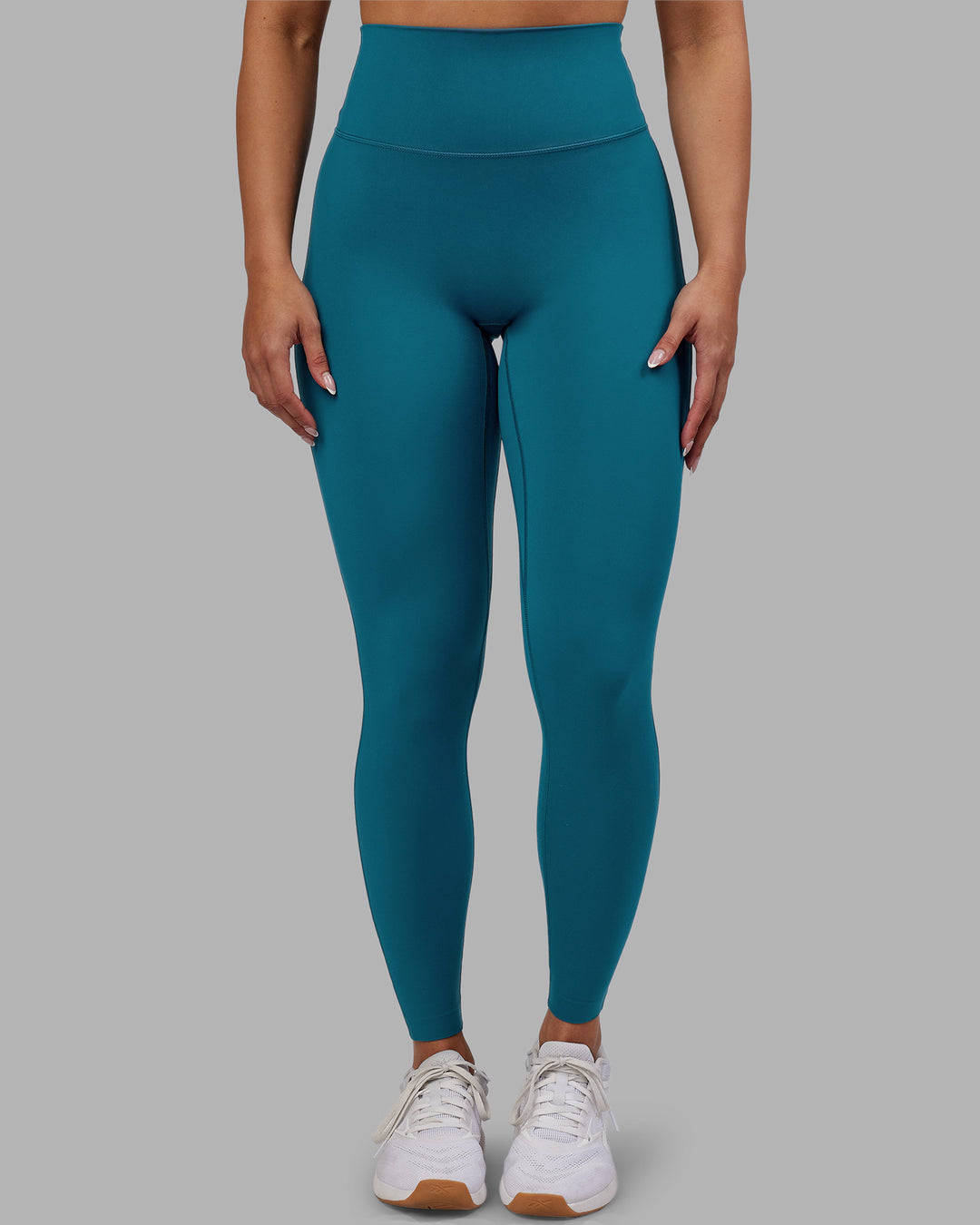 Woman wearing Elixir Ultra High-Rise Full Length Legging - Blue Coral | Model:Ayla | Size:S - view 1