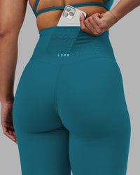 Woman wearing Elixir Ultra High-Rise Full Length Legging - Blue Coral | Model:Ayla | Size:S | Thumbnail Index: 6
