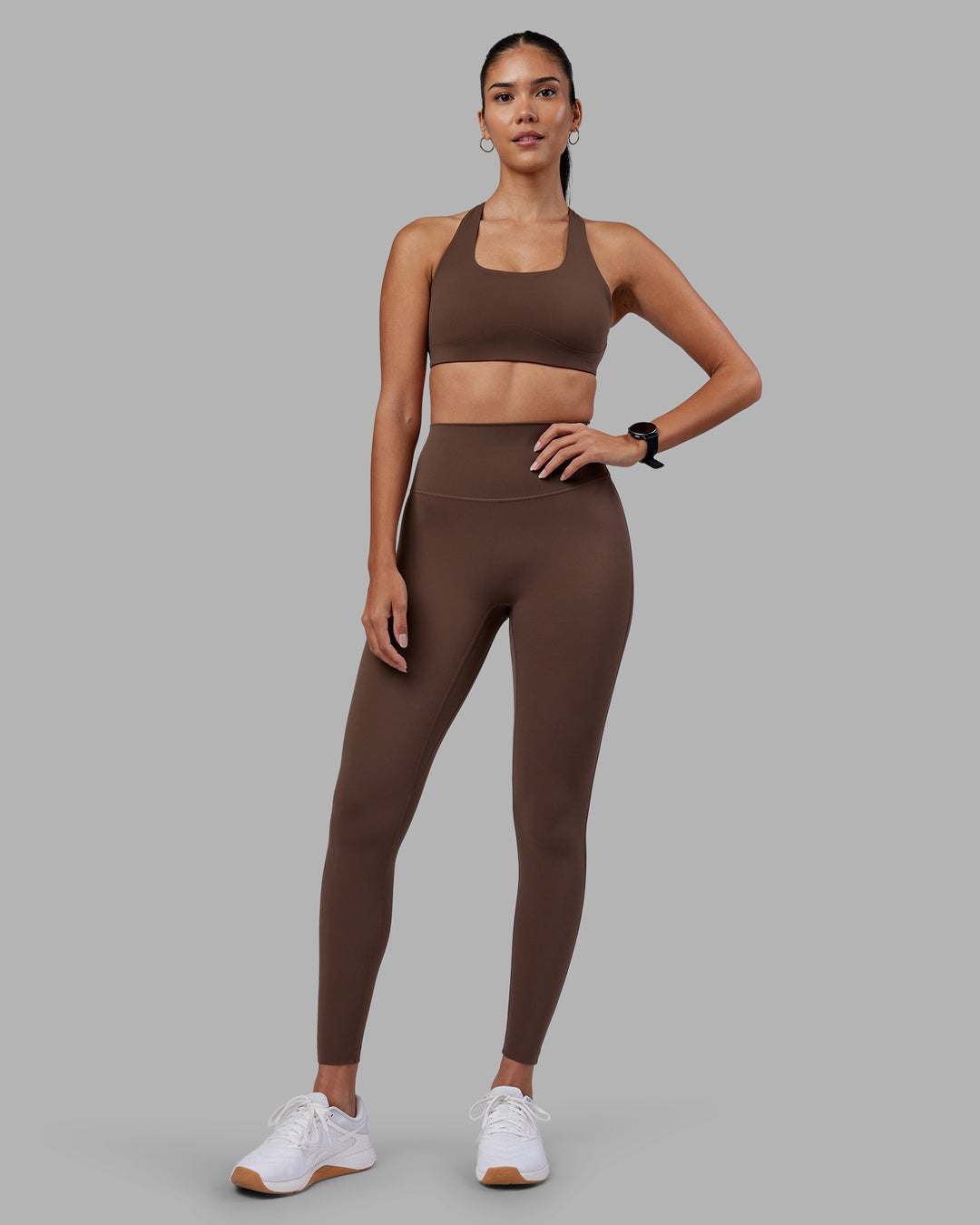 Woman wearing Elixir Ultra High-Rise Full Length Legging - Chocolate Martini | Model:Rhiley | Size:S - view 1