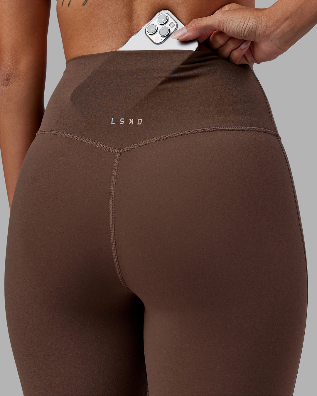 Woman wearing Elixir Ultra High-Rise Full Length Legging - Chocolate Martini | Model:Rhiley | Size:S - view 6