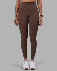 Woman wearing Elixir Ultra High-Rise Full Length Legging - Chocolate Martini | Model:Rhiley | Size:S | Thumbnail Index: 1