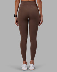 Woman wearing Elixir Ultra High-Rise Full Length Legging - Chocolate Martini | Model:Rhiley | Size:S | Thumbnail Index: 2