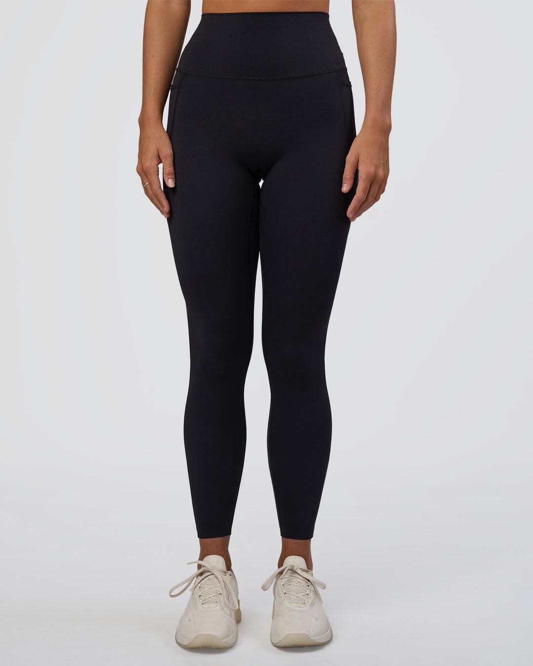 Woman wearing Elixir Ultra High-Rise Full Length Legging Pockets - Black | Model:Amity | Size:S - view 8