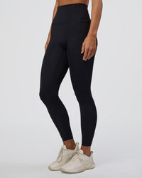 Woman wearing Elixir Ultra High-Rise Full Length Legging Pockets - Black | Model:Amity | Size:S | Thumbnail Index: 0