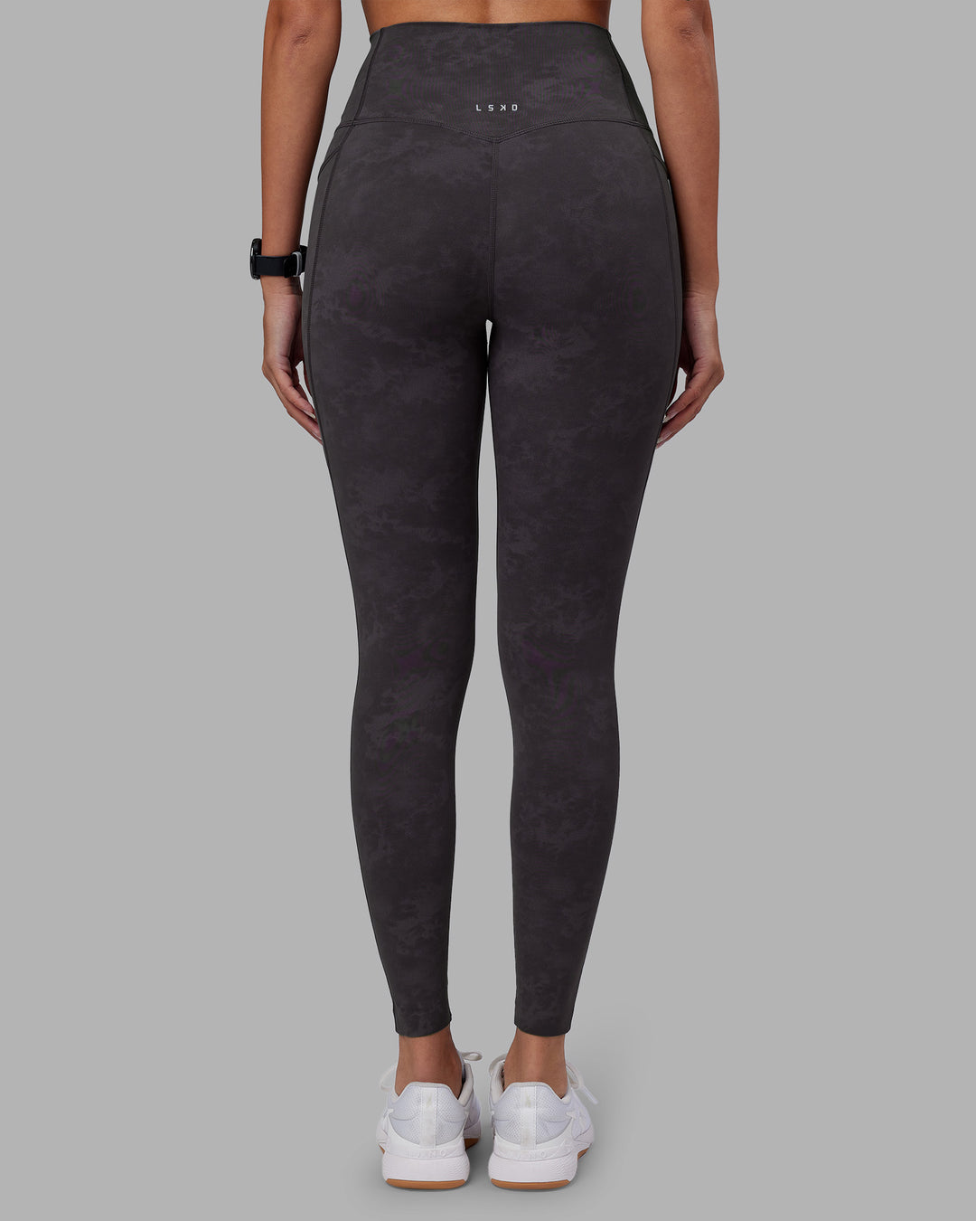 Woman wearing Elixir Ultra High-Rise Full Length Legging Pockets - Dark Storm Wash | Model:Rhiley | Size:S - view 4