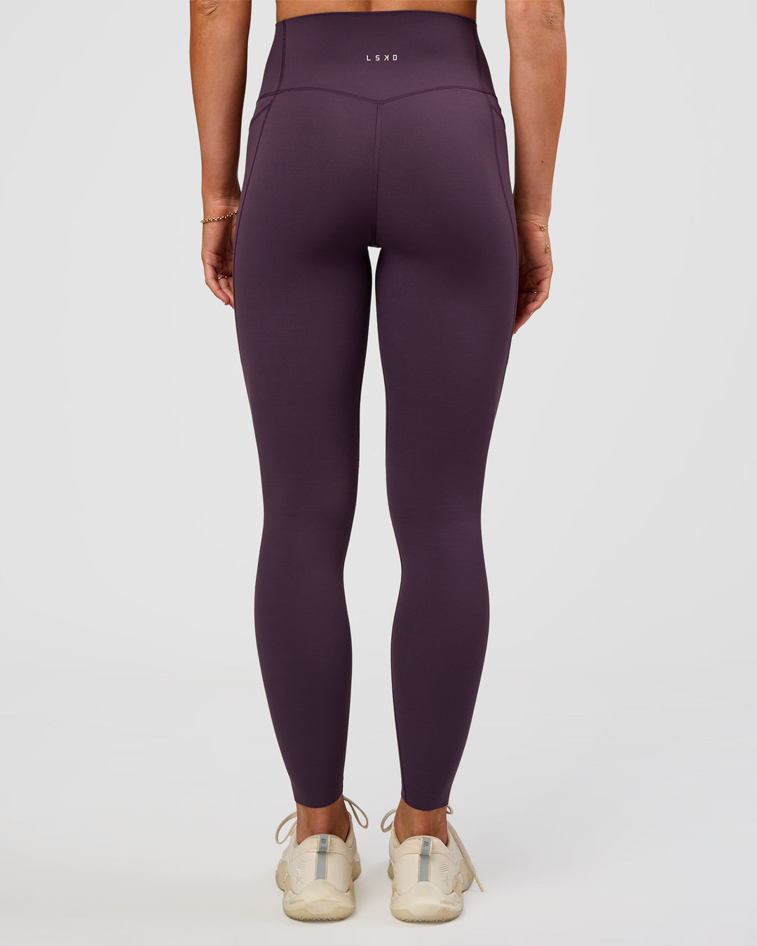 Woman wearing Elixir Ultra High-Rise Full Length Legging Pockets - Midnight Plum | Model:Emelia | Size:S - view 8