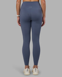 Woman wearing Elixir Ultra High-Rise Full Length Legging Pockets - Night Shadow | Model:Phoebe | Size:S | Thumbnail Index: 3