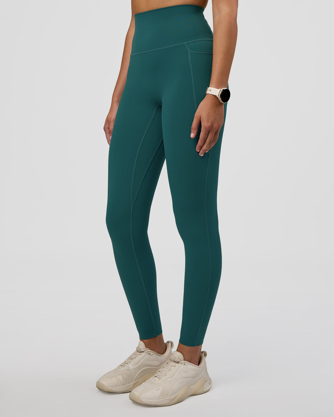 Woman wearing Elixir Ultra High-Rise Full Length Legging Pockets - Transformative Teal | Model:Myrte | Size:S - view 1