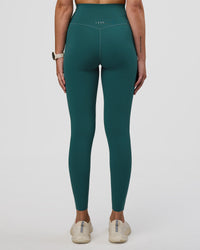 Woman wearing Elixir Ultra High-Rise Full Length Legging Pockets - Transformative Teal | Model:Myrte | Size:S | Thumbnail Index: 3