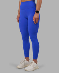 Woman wearing Elixir Ultra High-Rise Full Length Legging - Power Cobalt | Model:Keisha | Size:S | Thumbnail Index: 3