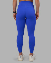 Woman wearing Elixir Ultra High-Rise Full Length Legging - Power Cobalt | Model:Keisha | Size:S | Thumbnail Index: 5