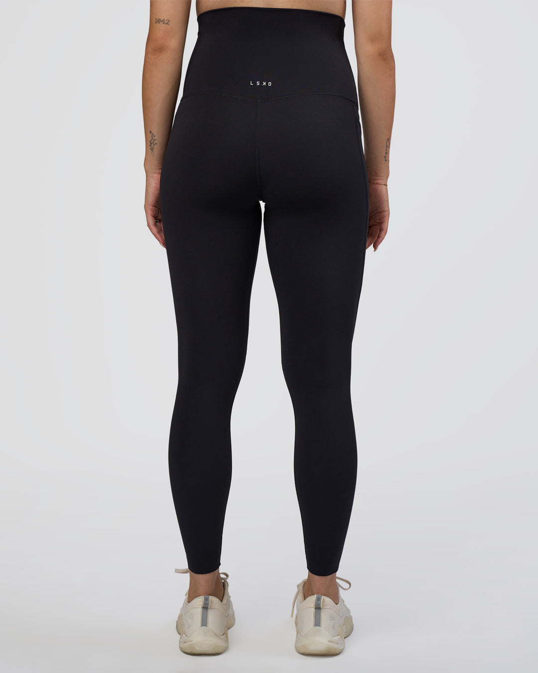 Woman wearing Elixir Ultra High-Rise Maternity Full Length Legging Pockets - Black | Model:Kitahna | Size:S - view 4