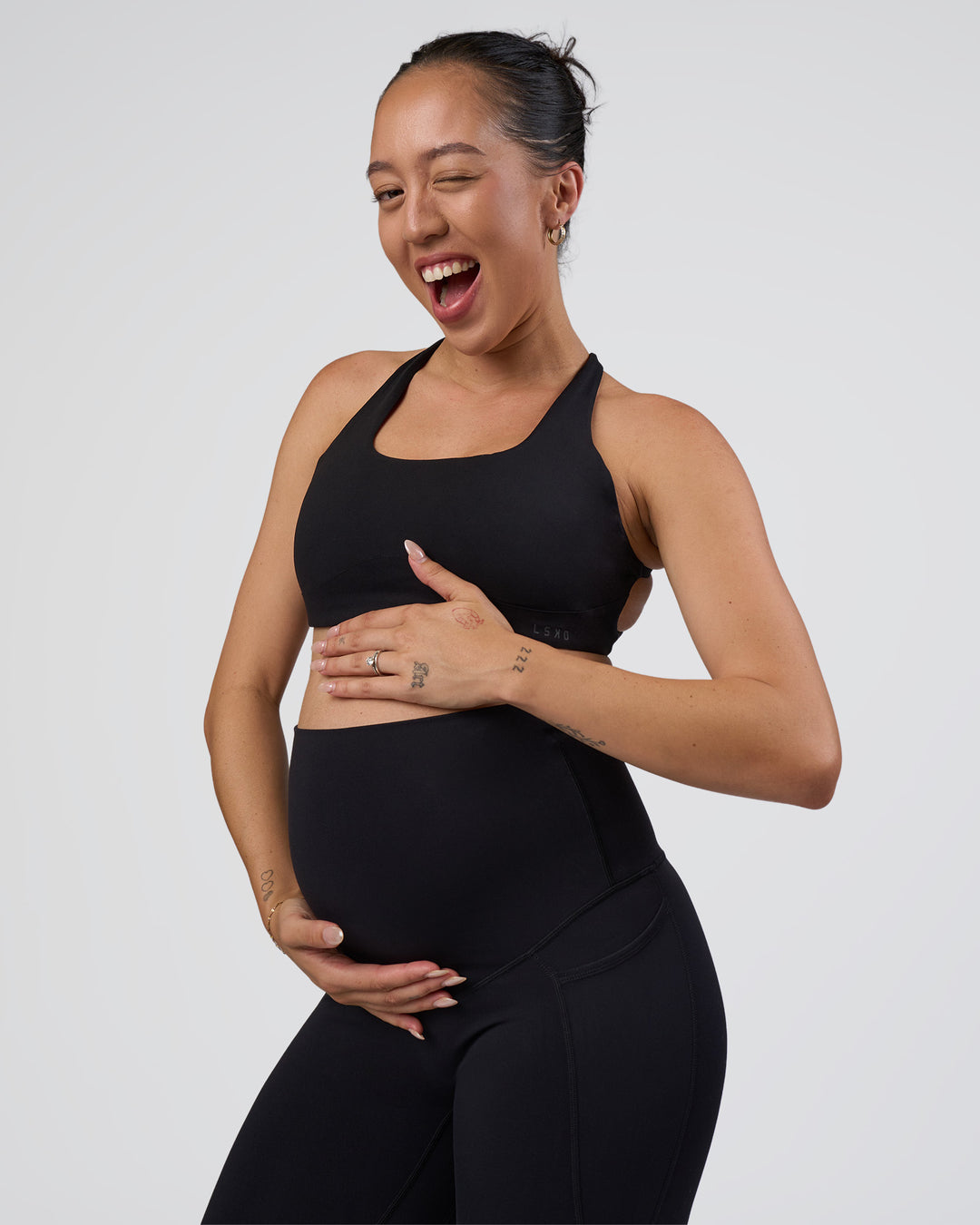 Woman wearing Elixir Ultra High-Rise Maternity Full Length Legging Pockets - Black | Model:Kitahna | Size:S - view 7