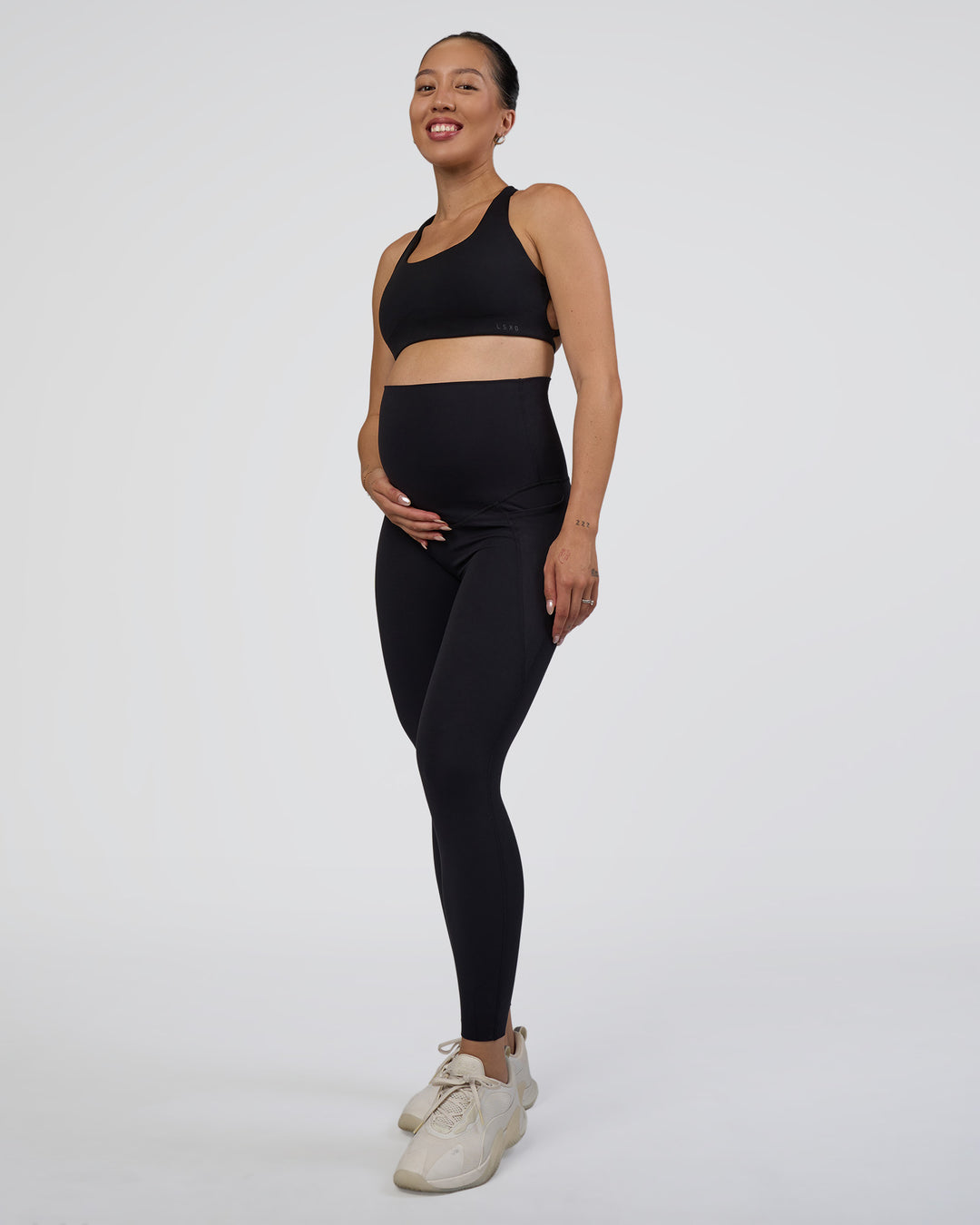 Woman wearing Elixir Ultra High-Rise Maternity Full Length Legging Pockets - Black | Model:Kitahna | Size:S - view 5