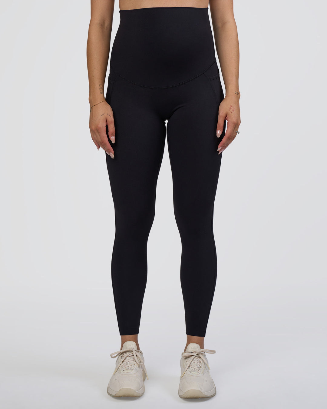Woman wearing Elixir Ultra High-Rise Maternity Full Length Legging Pockets - Black | Model:Kitahna | Size:S - view 8