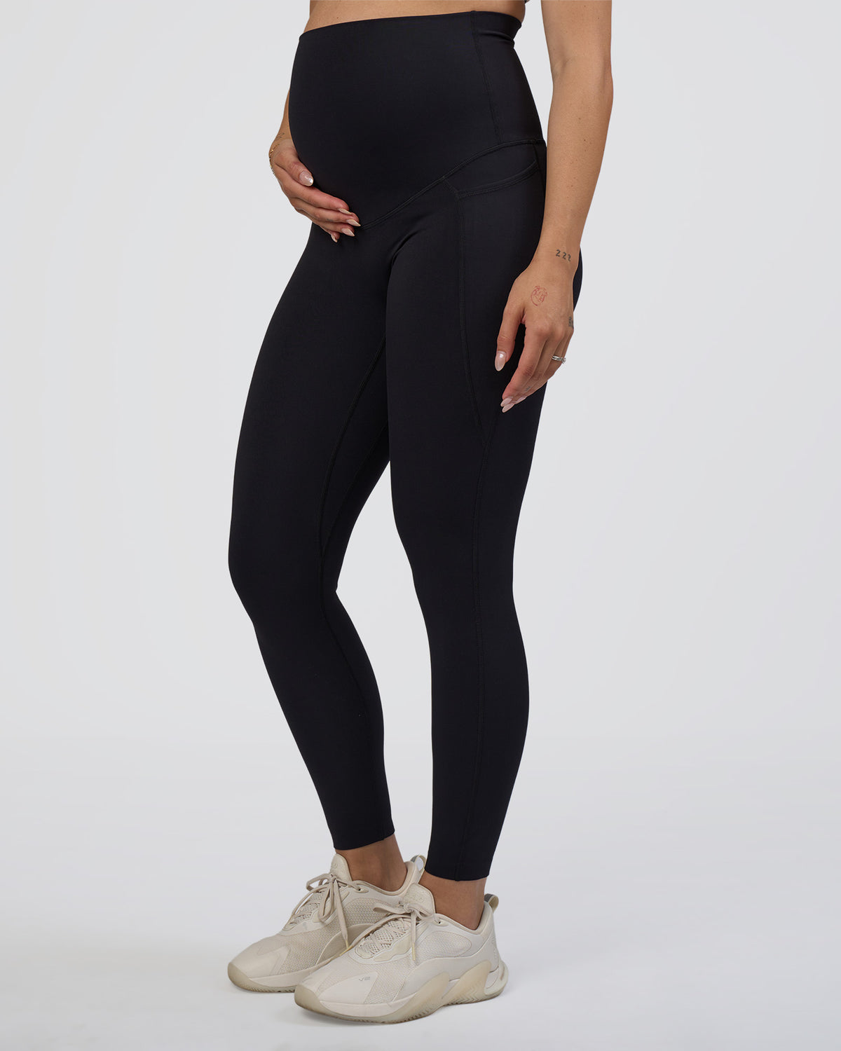 Woman wearing Elixir Ultra High-Rise Maternity Full Length Legging Pockets - Black | Model:Kitahna | Size:S