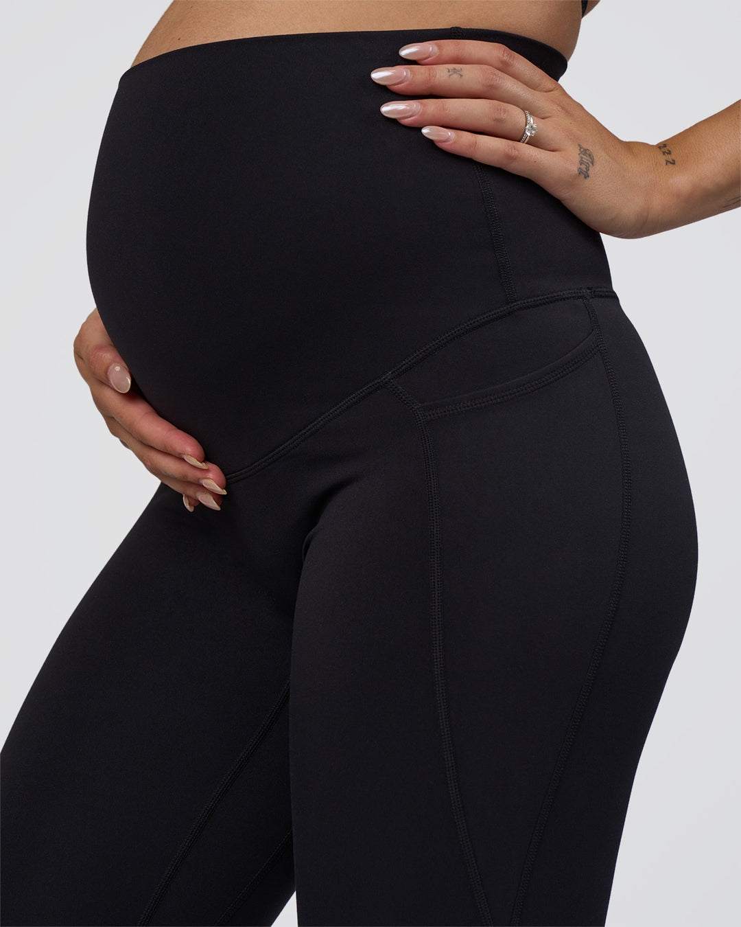 Woman wearing Elixir Ultra High-Rise Maternity Full Length Legging Pockets - Black | Model:Kitahna | Size:S - view 3