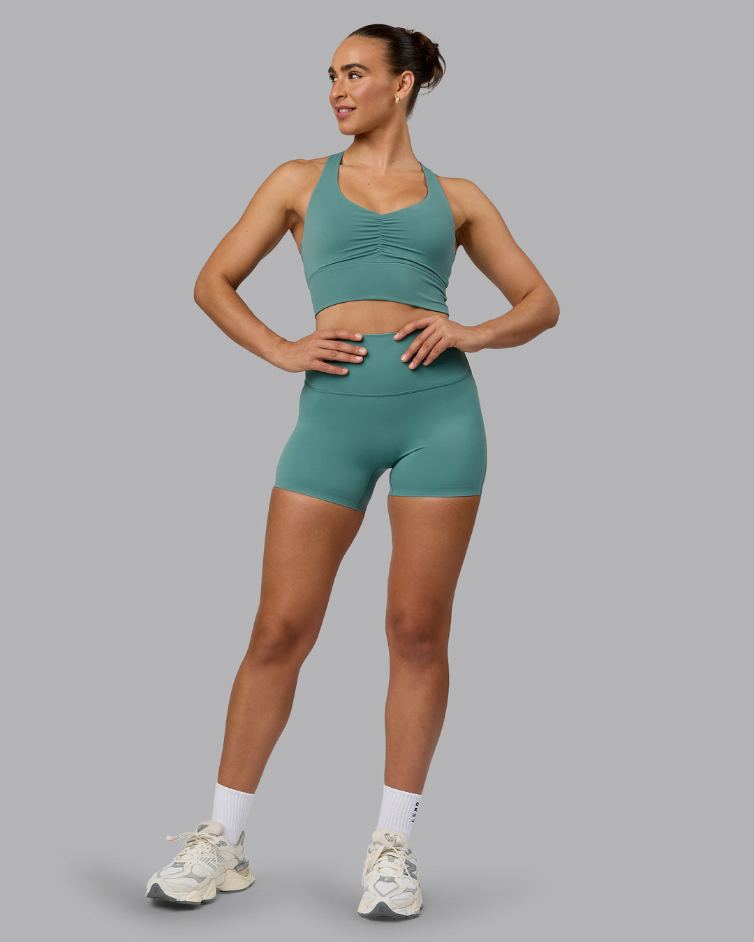 Woman wearing Elixir Ultra High-Rise 4" Short - Sagebrush | Model:Sophie | Size:S - view 5