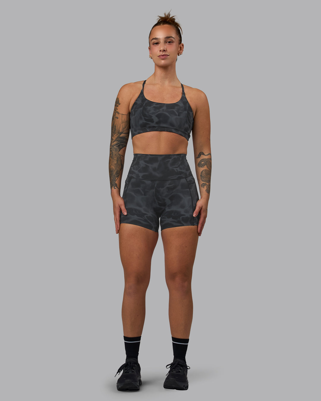 Woman wearing Elixir Ultra High-Rise 4" Short Pockets - Tranquil-Black | Model:Robyn | Size:S - view 6