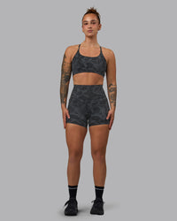 Woman wearing Elixir Ultra High-Rise 4" Short Pockets - Tranquil-Black | Model:Robyn | Size:S | Thumbnail Index: 5