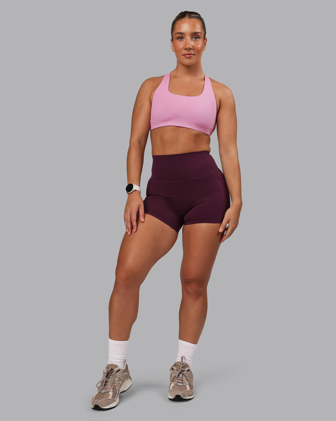 Woman wearing Elixir Ultra High-Rise 4" Short Pockets - Cherry Lacquer | Model:Lyss | Size:S - view 1