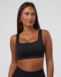 Woman wearing Ember Seamless Sports Bra - Black | Model:Brylee | Size:XS | Thumbnail Index: 5