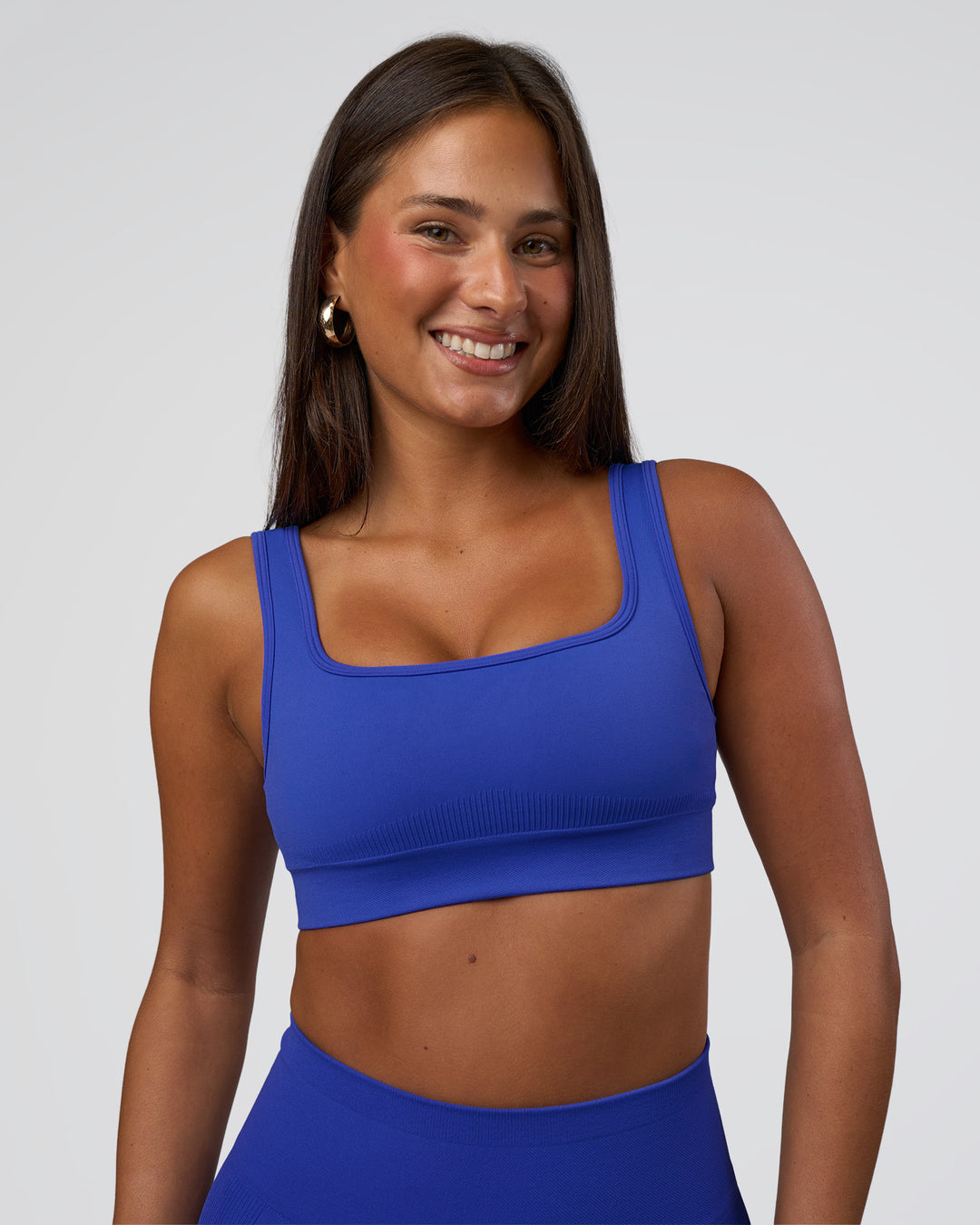 Woman wearing Ember Seamless Sports Bra - Power Cobalt | Model:Bianca | Size:S - view 6