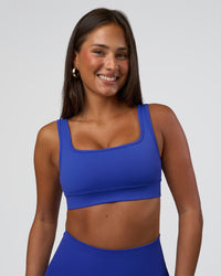 Woman wearing Ember Seamless Sports Bra - Power Cobalt | Model:Bianca | Size:S | Thumbnail Index: 5