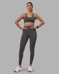 Woman wearing Empower Sports Bra - Dark Storm | Model:Rhiley | Size:S | Thumbnail Index: 2