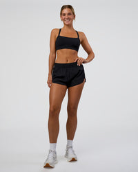 Woman wearing Energy 1.8" Training Short - Black | Model:Amity | Size:S | Thumbnail Index: 1