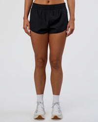 Woman wearing Energy 1.8" Training Short - Black | Model:Amity | Size:S | Thumbnail Index: 6