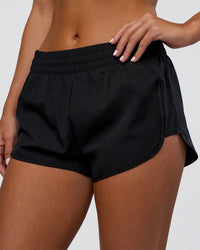 Woman wearing Energy 1.8" Training Short - Black | Model:Amity | Size:S | Thumbnail Index: 2