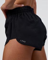 Woman wearing Energy 1.8" Training Short - Black | Model:Amity | Size:S | Thumbnail Index: 5