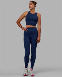 Woman wearing Enhance Shelf Bra Tank - Midnight Blue | Thumbnail Index: 1