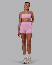 Woman wearing Enhance Ultra High-Rise 4" Short - Pink Frosting | Model:Phoebe | Size:S | Thumbnail Index: 6