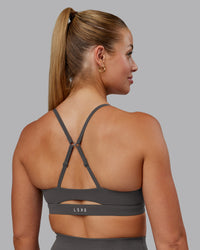 Woman wearing Essence Sports Bra - Dark Storm | Model:Hannah | Size:S | Thumbnail Index: 6
