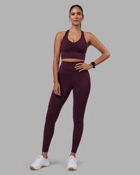 Woman wearing Evoke Longline Sports Bra - Cherry Lacquer | Model:Rhiley | Size:S | Thumbnail Index: 6