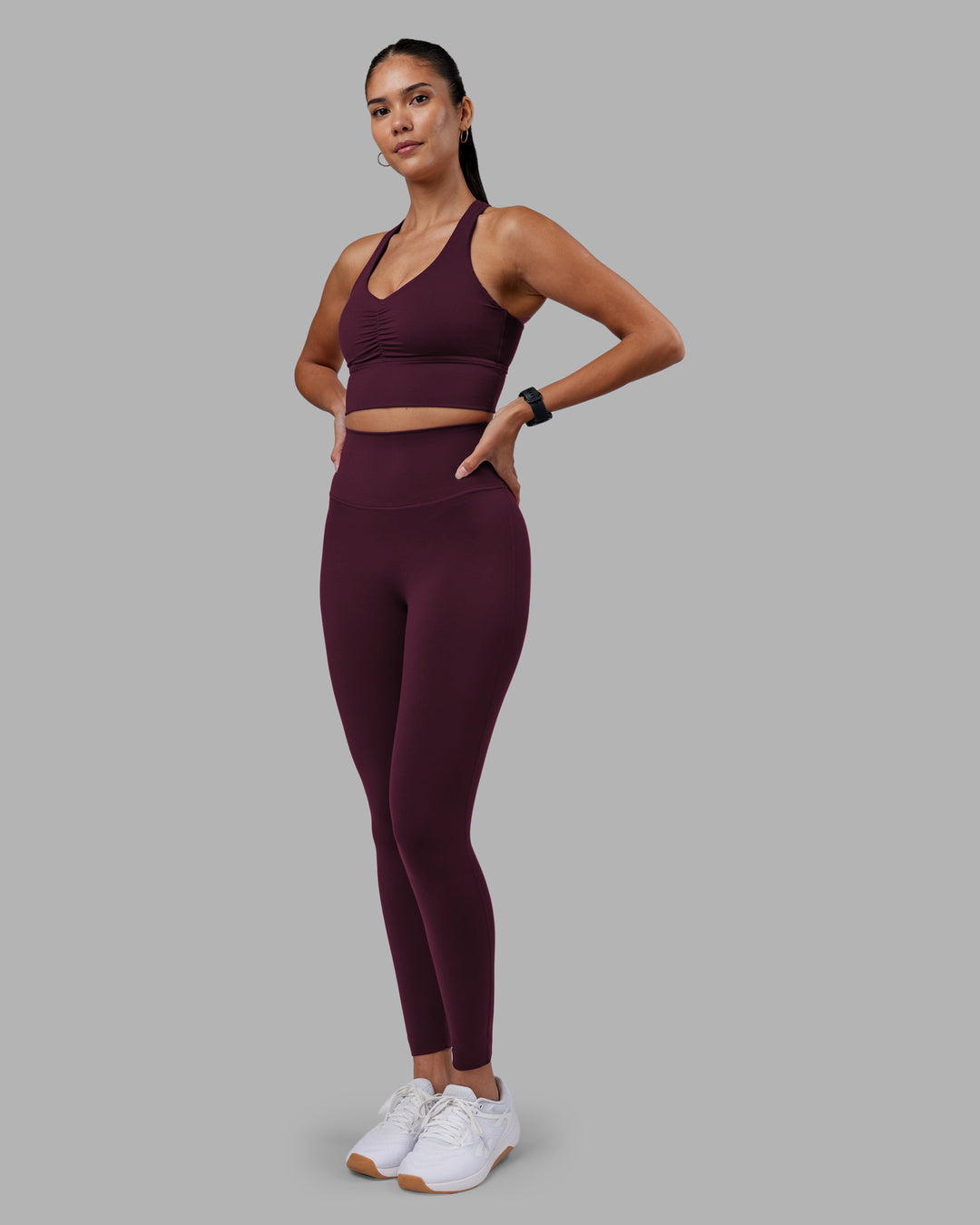 Woman wearing Evoke Longline Sports Bra - Cherry Lacquer | Model:Rhiley | Size:S - view 5
