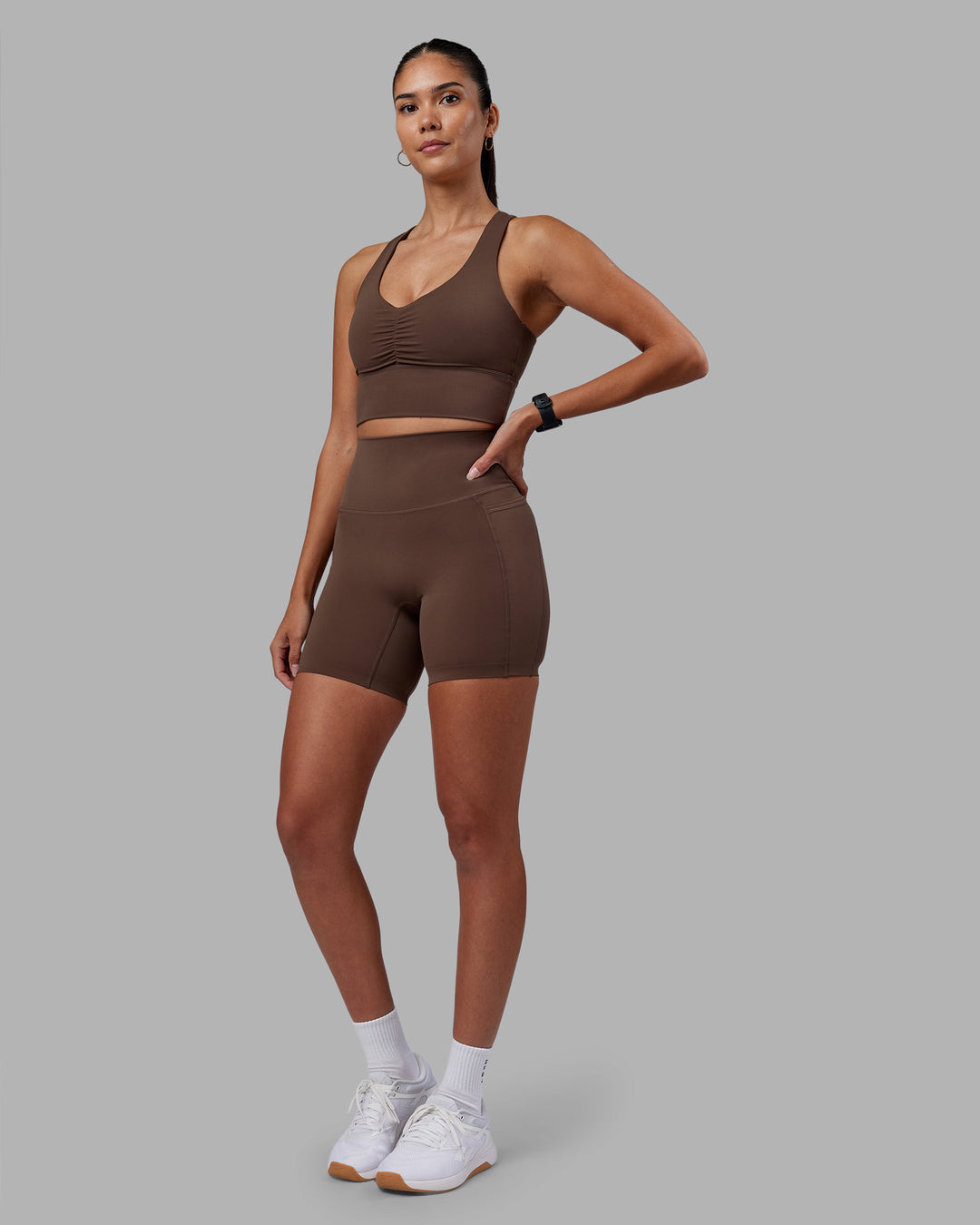 Woman wearing Evoke Longline Sports Bra - Chocolate Martini | Model:Rhiley | Size:S - view 3