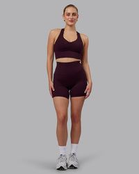 Woman wearing Evoke Sports Bra - Mulberry | Thumbnail Index: 6